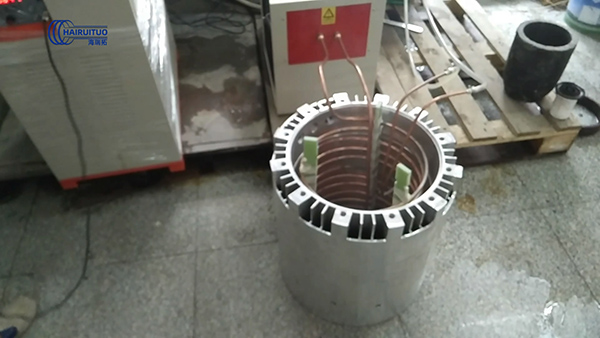 中頻感應(yīng)加熱設(shè)備對電機熱套試樣